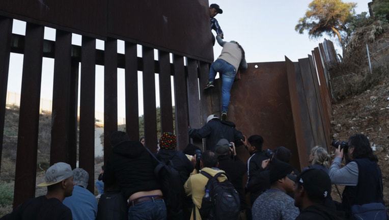 05751886-GETTY-Migrant-caravan-tijuana_1544618535895.jpg