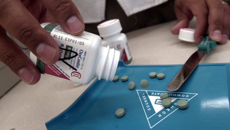 12c36793-39351701oxyc_20020322_00366.jpg_1518371446965