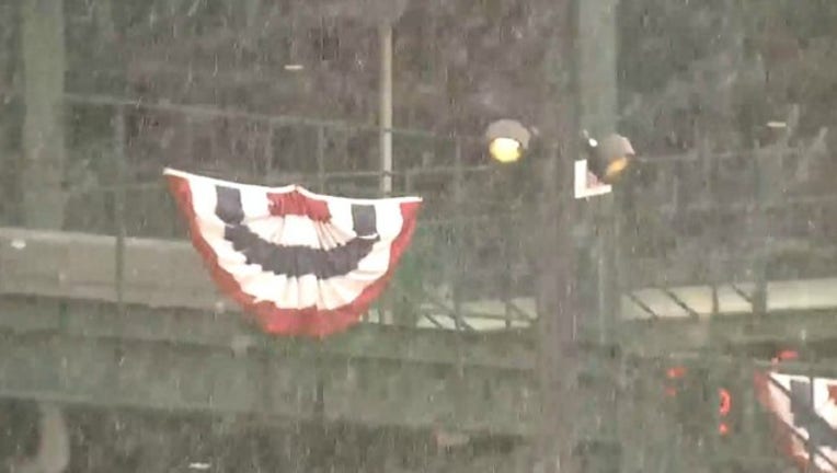 14e2f28a-cubs-snowy-home-opener_1523287750979.jpg