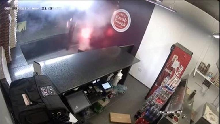 Someone left lit fireworks inside a pizza parlor in Liverpool