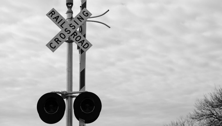 297a40a4-train railroad crossing_1482984625948.jpg