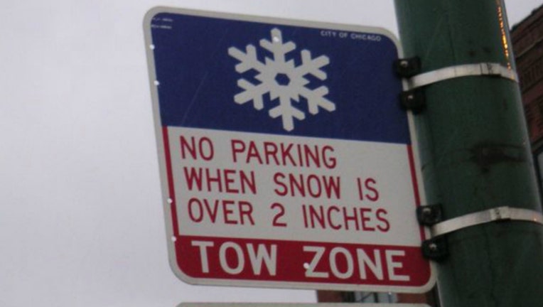 3c8363b6-chicago winter parking tow sign_1480123582540.jpg