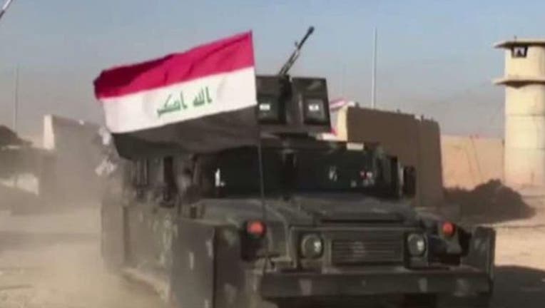 403d77db-iraq war isis