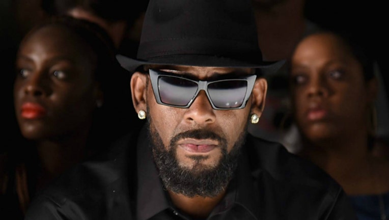 57696afe-GETTY r kelly_1522272557863.jpg.jpg