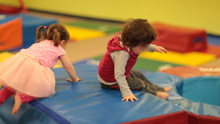 59b3fcfd-daycare-children-playing_1475250774365.png