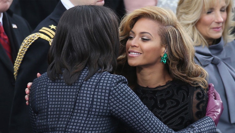 59fe39cd-GETTY Michelle Obama and Beyonce_1555711260959.jpg-407693.jpg
