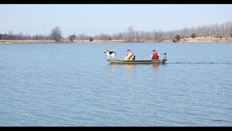 5deea084-lake-boat-winter.jpg