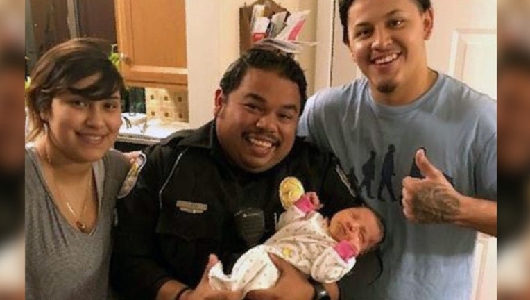 612ac2d7-cop saves baby new_1543685350186.jpg.jpg