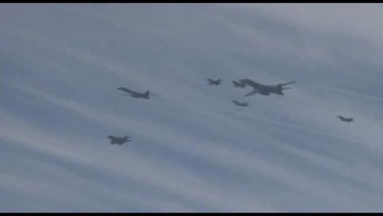 61692ce5-Two US bombers went on practice runs with South Korean fighter jets this weekend