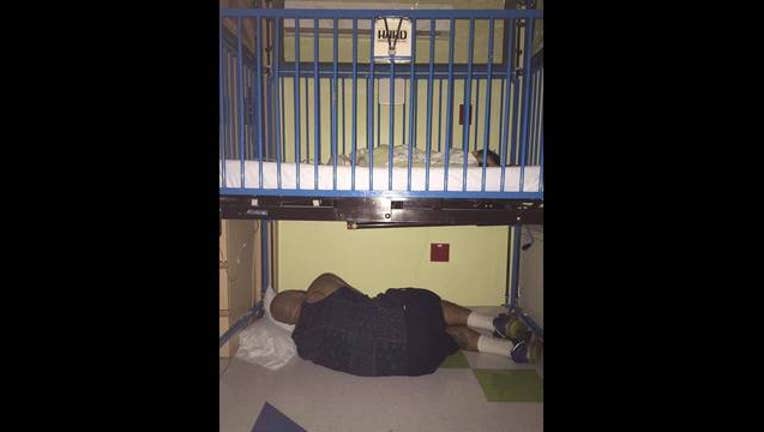 6503b69f-Dad Sleeps Under Crib_1467917156768-401096.jpg