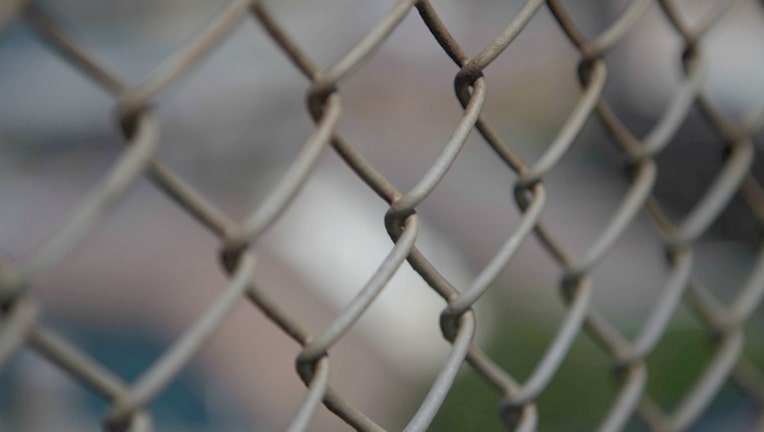 6accec67-Chain link fence by Chris Hoare via Flickr