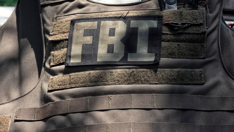 6d571480-fbi-vest_1497450426392.jpg