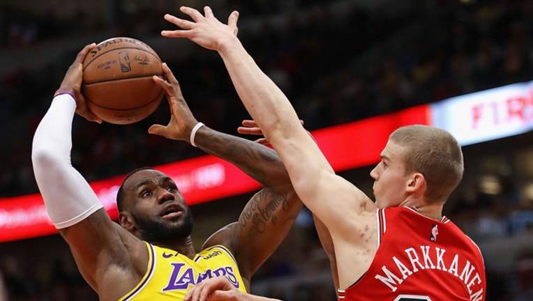 742e0bb6-GETTY-lebron-james_1552480474886.jpg