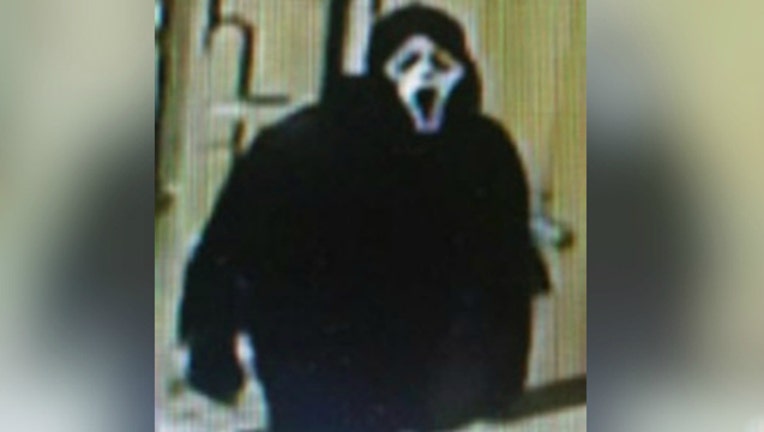 scream-mask-robber_1476816116323.jpg