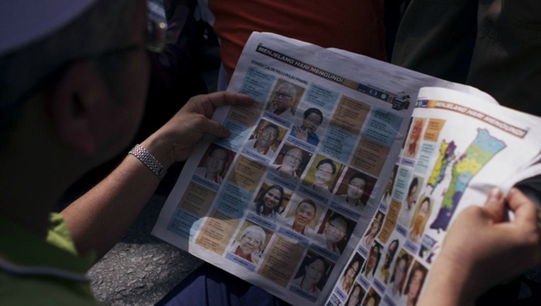 GETTY-malaysia-newspaper_1522074001773.jpg