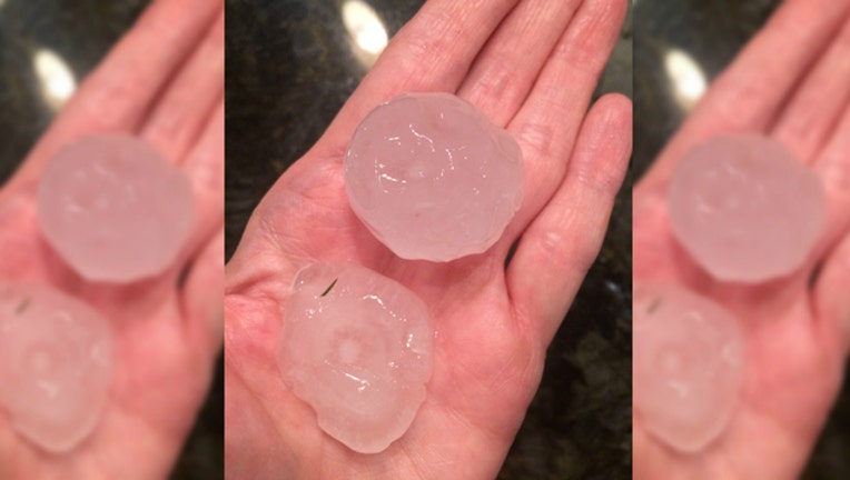 7daaa1cb-Photo of golfball-sized hail in West Chicago taken by Donna Houck
