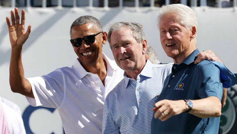 9197a52b-GETTY obama bush clinton_1506725984516.jpg