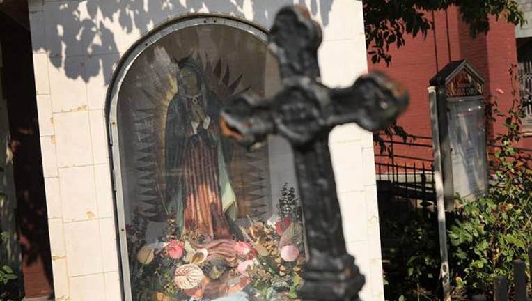 9602d34e-Getty Priest charged with drugging, raping woman_1552777282677.jpg-408200.jpg