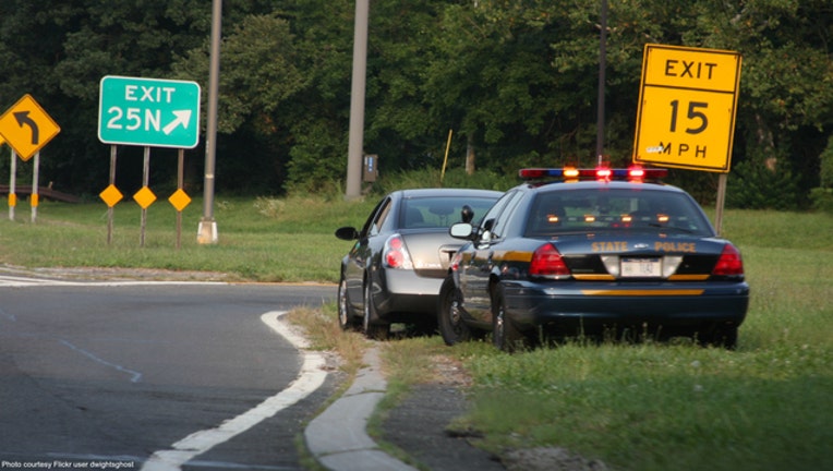 96ca2088-Stock photo of police traffic stop by Flickr user dwightsghost
