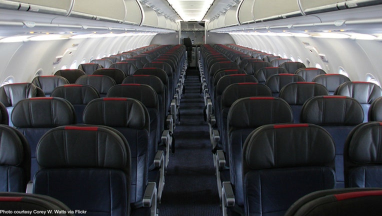 Seats on an airplane - stock photo courtesy of Corey W Watts via Flickr