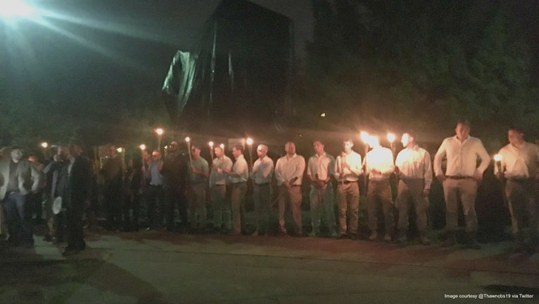 9ae1b252-Neo-Nazis marched in Charlottesville, Virginia on Saturday night.