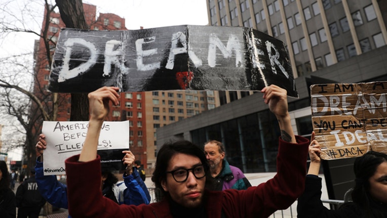 9d9d1f05-GETTY-Daca-dreamers_1535929702971.jpg