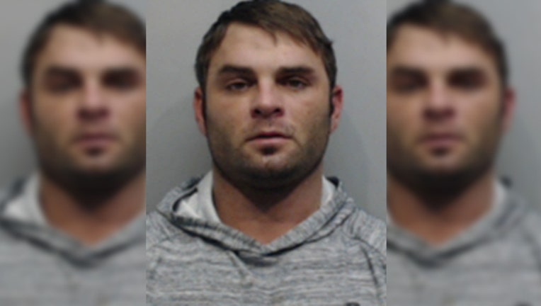 af81a671-KYLEPOLICE DUSTINAMMONSMUG 032619-407693