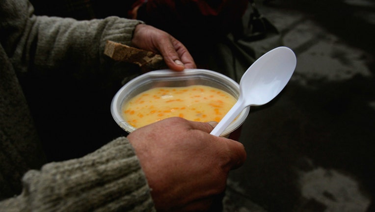 GETTY Stock image homeless person and soup