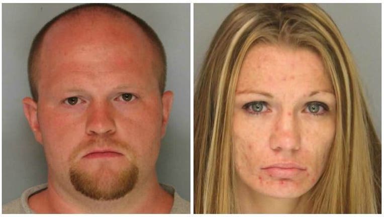 Parents arrested in Hall Co-404959. after leaving baby on road