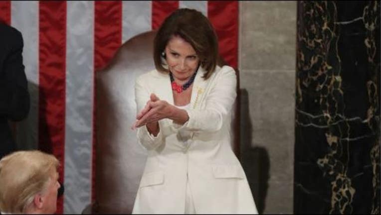 b9770e14-nancy pelosi the clap getty_1549486171150.JPG-405538.jpg