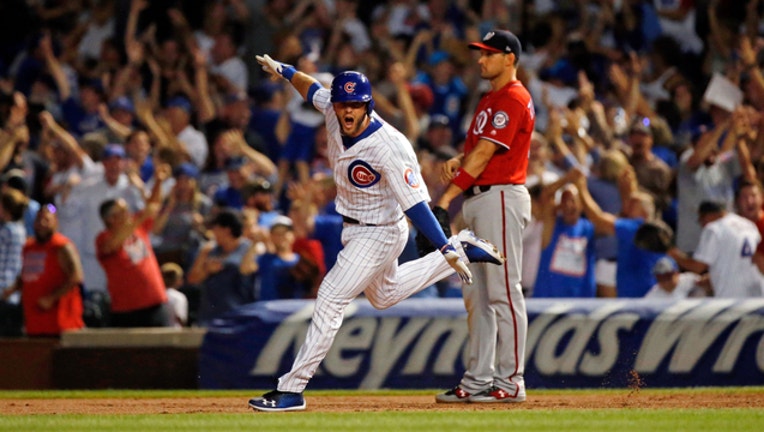 bfa1b81c-GETTY-Cubs-walk-off-win_1534160855809.jpg