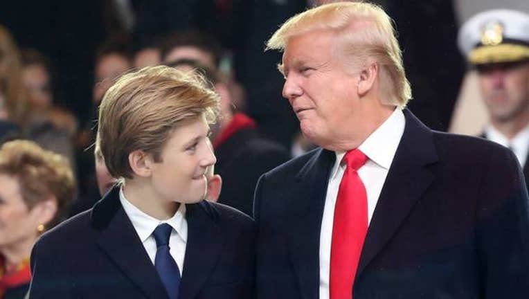 c08266a2-Getty Trump with son Barron_1553097693193.jpg-408200.jpg