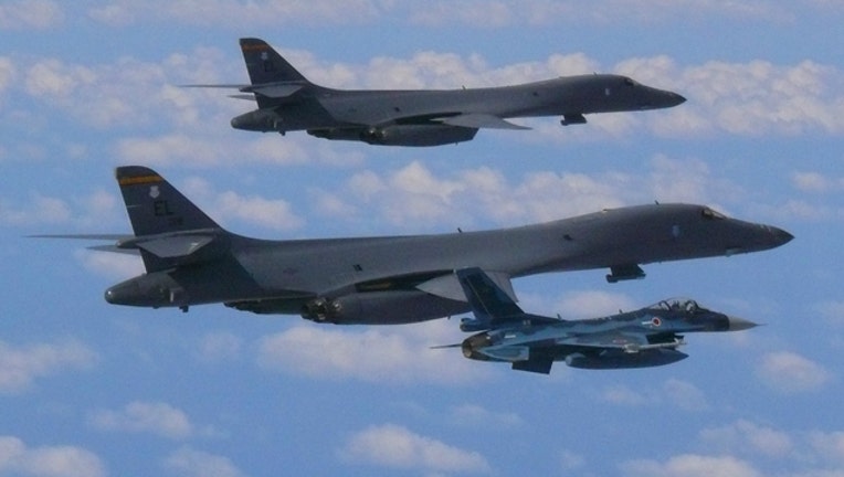 US Air Force and Japan Air Self-Defense force over East China Sea before going to Seoul, South Korea