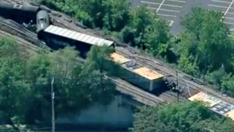 d883510b-train derail_1527208209152.jpg.jpg