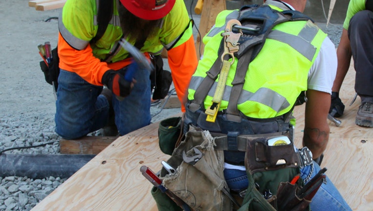 dd9b4707-Construction workers generic US Government source photo