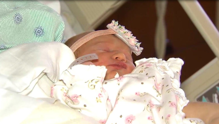 de13bafd-Wrigley Rose Dalbey, the first baby born in Cook County in 2017