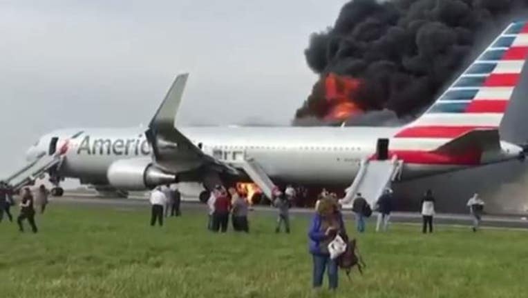 df1f1890-american-airlines-fire-ohare_1477688648354.JPG