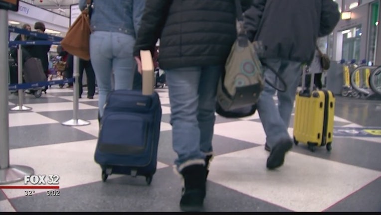 Travelers stranded at O'Hare because of flight cancelations caused by snow storm