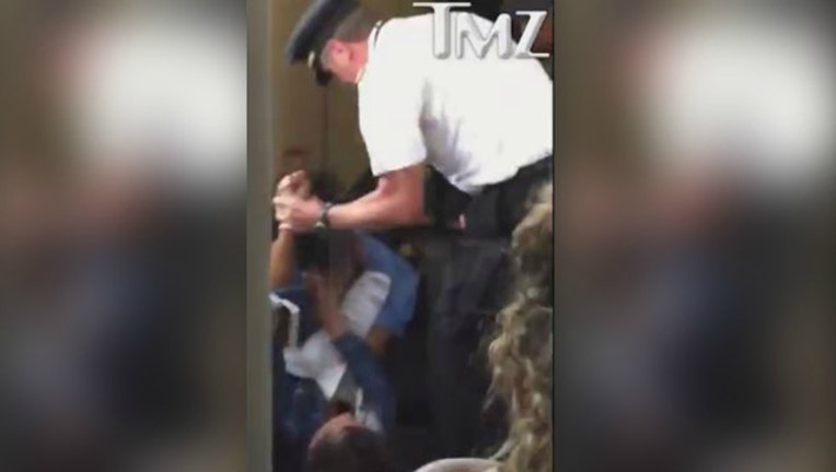e4136a68-Still image of Delta pilot intervening in brawl on jetway courtesy of TMZ
