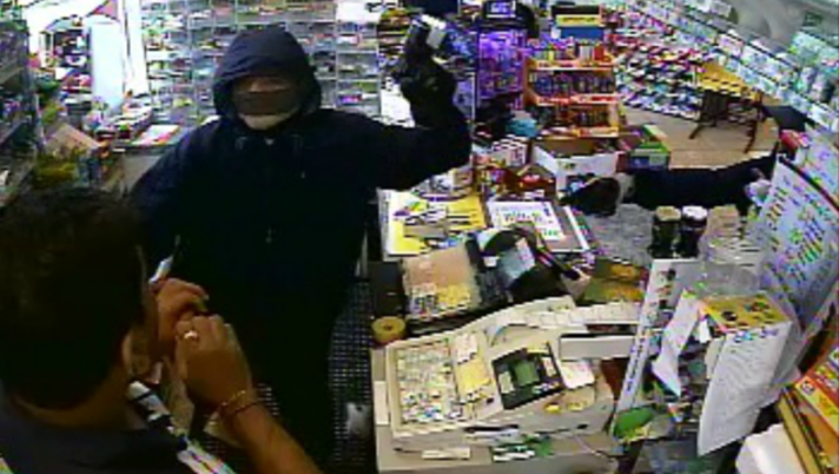 e5d39ee0-pistolwhipping-robber-woodstock_1499954537677.png