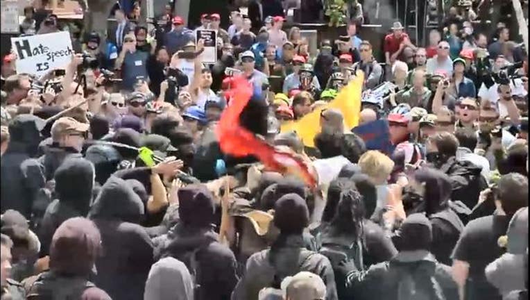 e8f28e8e-Brawls break out between Trump opponents and supporters in Berkeley, California