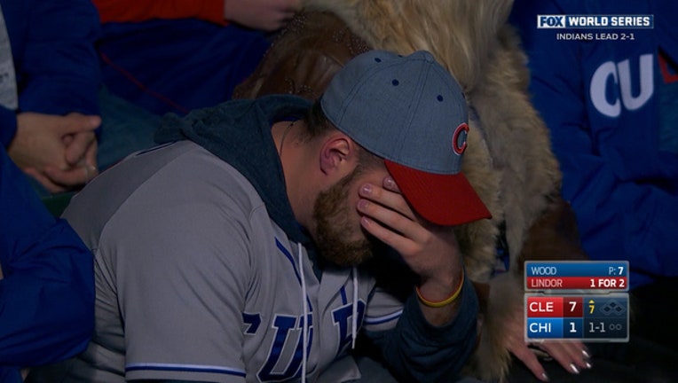 ef53e3f7-SAD CUBS FAN_1477796298840.jpg