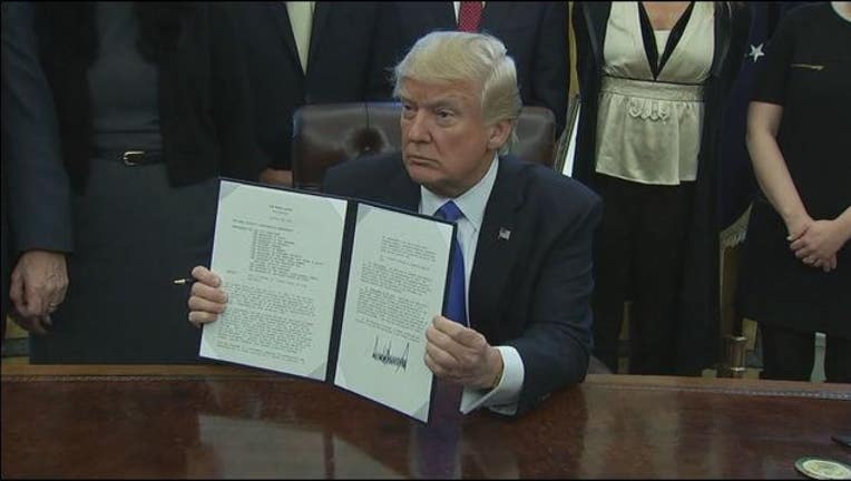 f8a58266-President Trump signs an executive order giving the Joint Chiefs 30 days to come up with a plan to defeat ISIS.