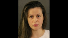 Woman charged with promoting prostitution from suburban massage parlor