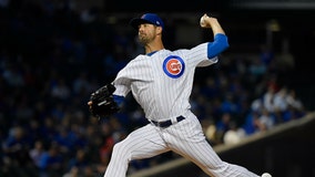 Benches clear after Hamels fastball clips Molina's arm