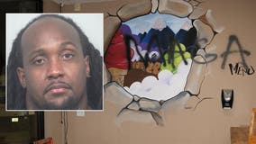 Ex-NFL player accused of trashing his 2 businesses to make it look like a hate crime