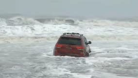 Driver abandons Jeep in waves after getting stuck on South Carolina beach during Hurricane Dorian