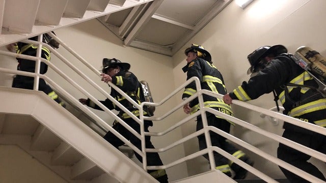 Firefighters climb 110 flights of stairs to honor those lost in the 9/11 attacks