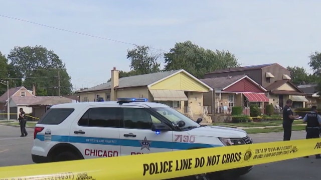 Woman critically hurt inside Englewood home by stray bullet after man shot outside