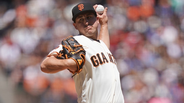 Cubs add Holland to active roster